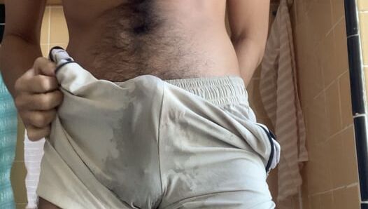 Hairy boy rubs, pees shorts and cums after