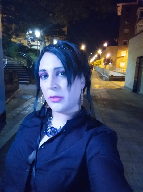 Sissy latina taniax,walking through the city night,wearing small chastity cage.