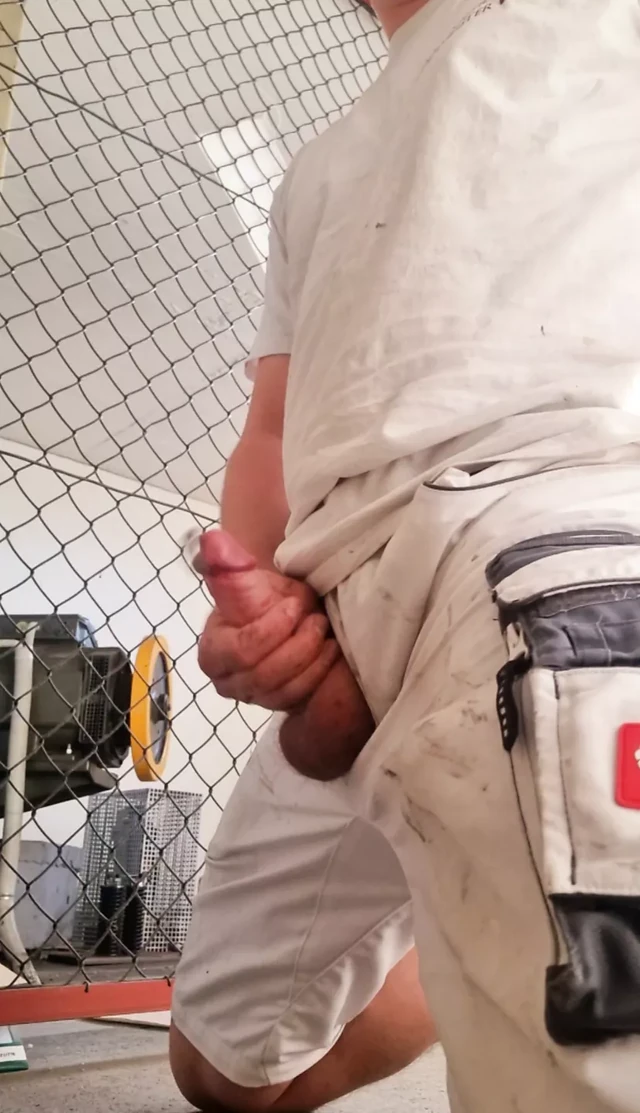 Worker jerks off with pierced cock in engine room