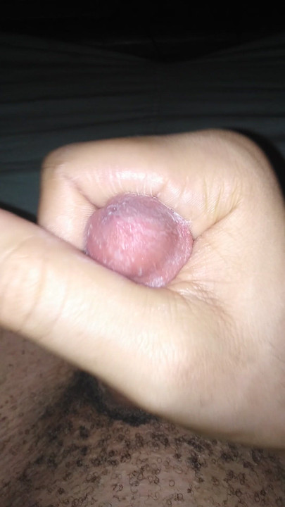 Masturbating