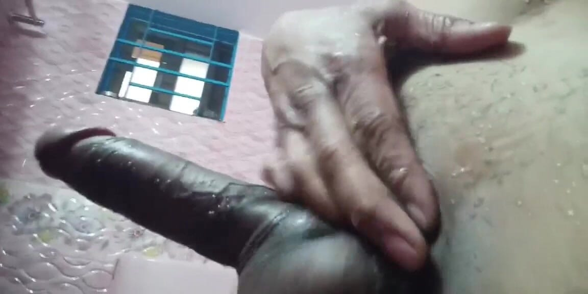 Masturbating