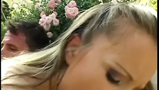 Busty beauty gets double penetrated outdoors