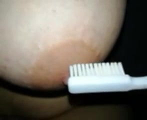 My nipple with toothbrush 2