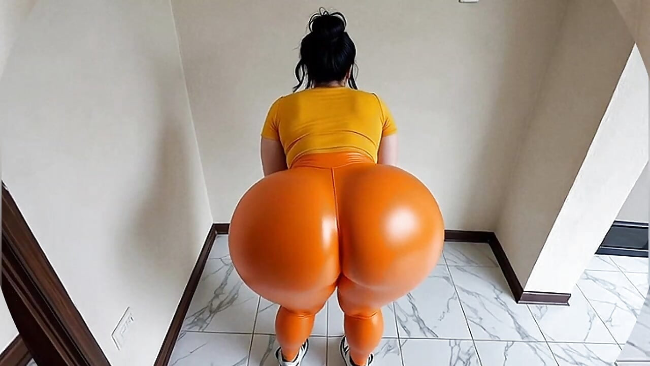 Wanita pantat besar dengan legging oranye bergerak