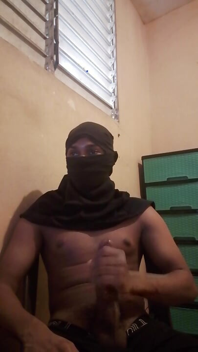 Masked big black cock masturbates