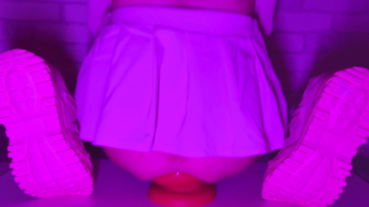 Sissy Girl In Short Skirt Bounces On a Huge 12-centimeter Thick Anal Plug