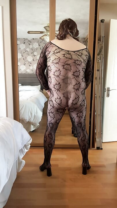 Sexy crossdresser wearing and wanking in lace sheer bodystocking.