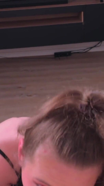 Captivating moment from "Ritzy Rain's Relentless Deepthroat - On Her Knees, On the Sofa, and Finished with a Throat-Pie"