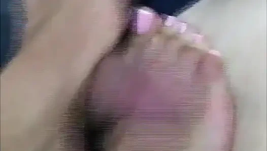 Footjob Session at Home While the Foot Guy Lies on the Floor.