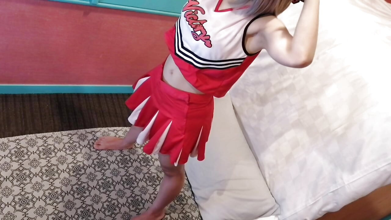 A cute, busty married woman performs exercise 4 in an erotic cheerleader costume. Peeking down from above. Home made amateur Private Shoot