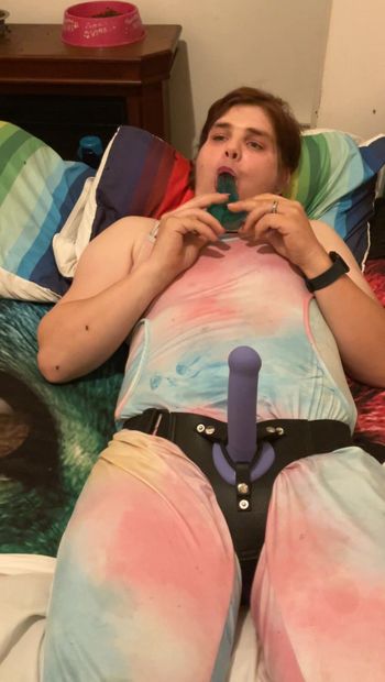 Transgender woman playing with dildo