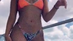 sexy girl girl dancing in bikini on a boat