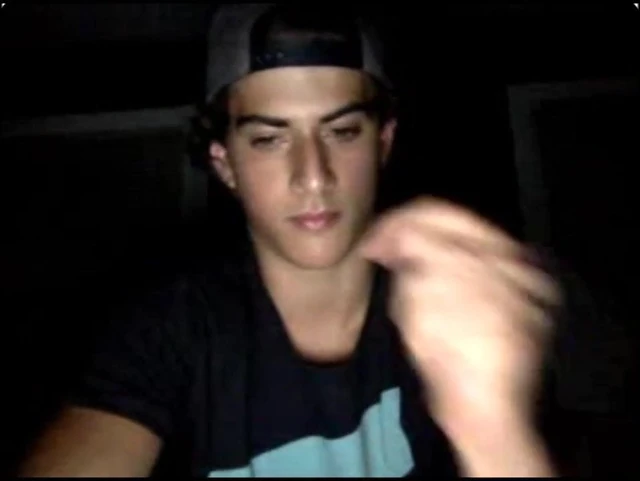 Baseball cap lad wanking on cam