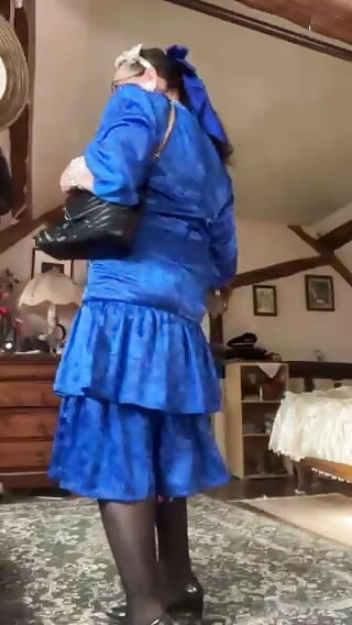In a vintage dress