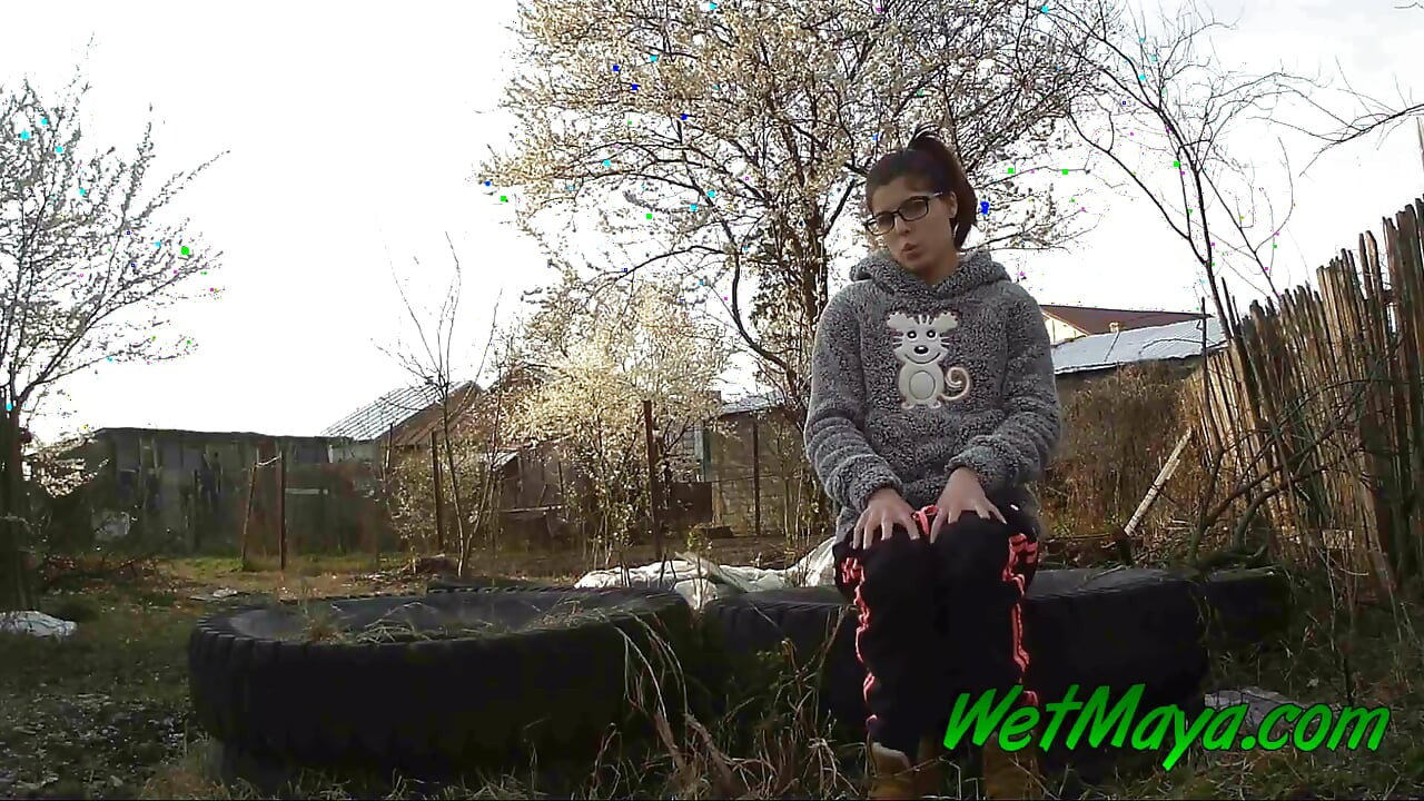 Peeing on some old tires in the yard