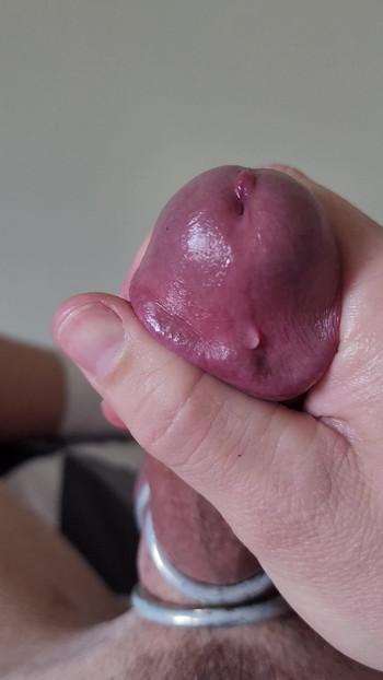 Iconic moment from "Up close slowly edging ringed hot throbbing mushroom tipped cock with precum"