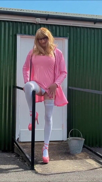 Emotional moment from "Tranny Gina In Pink PVC Dress Masturbating, Cumming"
