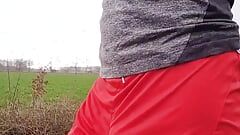 Slender boy jogging provocatively with cockring. Walkers watching me and my bulge in my pants