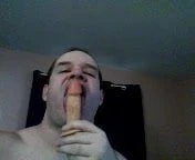 Sucking on  a  dildo
