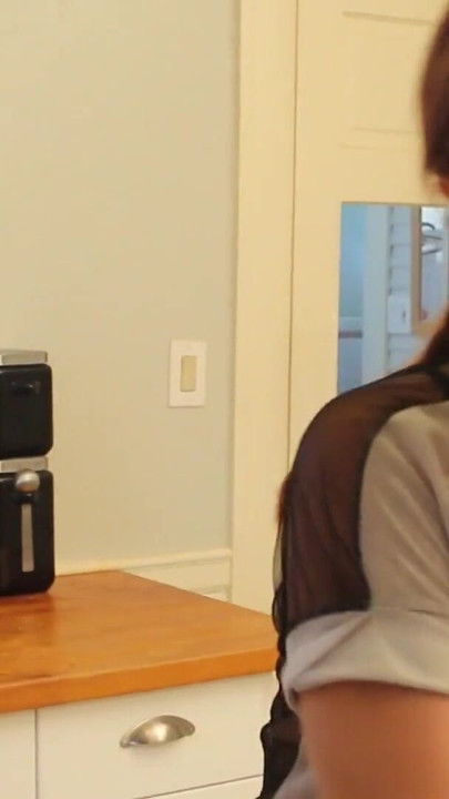 Unforgettable moment from "Short haired babe licks randy redhead's pussy in the kitchen"