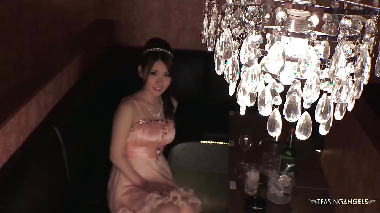 A sexually explicit scenario unfolds in which an Asian woman engages in oral sex with her partner in a restaurant, followed by a