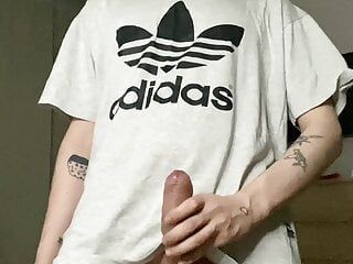 A handsome student came home and started jerking off a dick and cumming a lot of sperm on his T-shirt