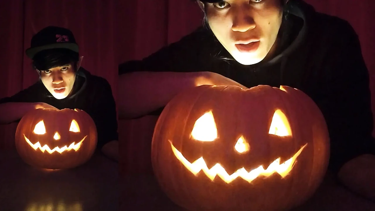 SFW Jon Arteen cute twink emo femboy carves a Halloween pumpkin in his underwear Jack-o’-Lantern