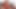 Brunette shemale slips out of her red lingerie to masturbate