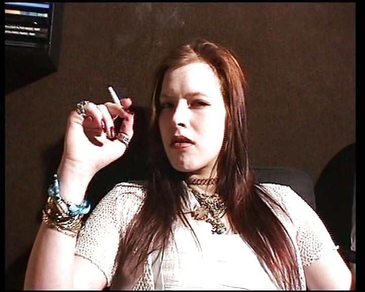 Redhead German bitch stuffs her twat with big didlo