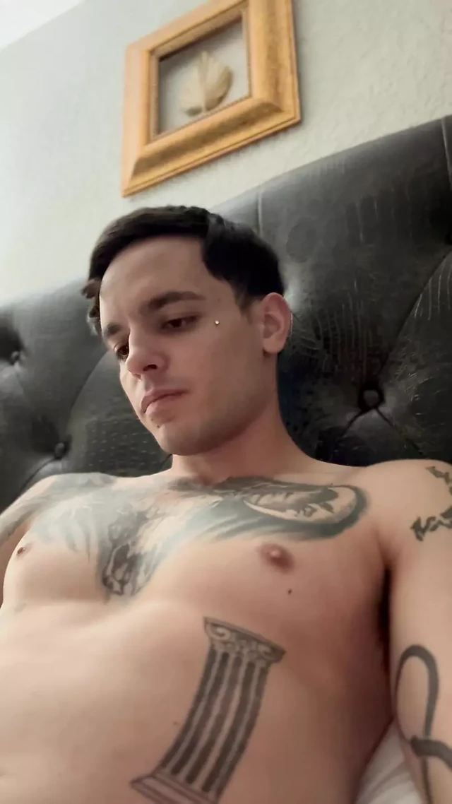 Adult starts to insert piercing into hole and pre