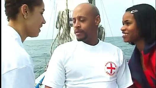 Couple of nice ebony babes are doing one cock on the deck of sailing ship