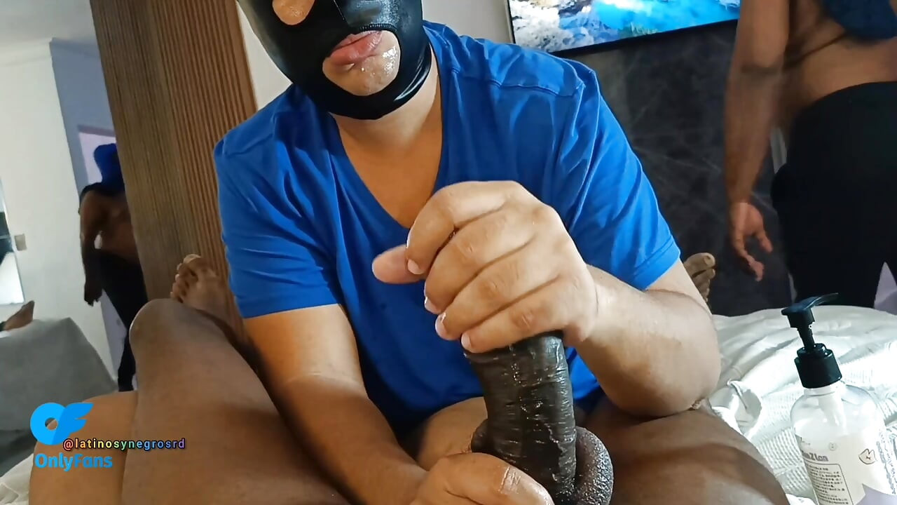I lie on my neighbor's belly and suck his huge thick black cock as he comes out of his boxers.