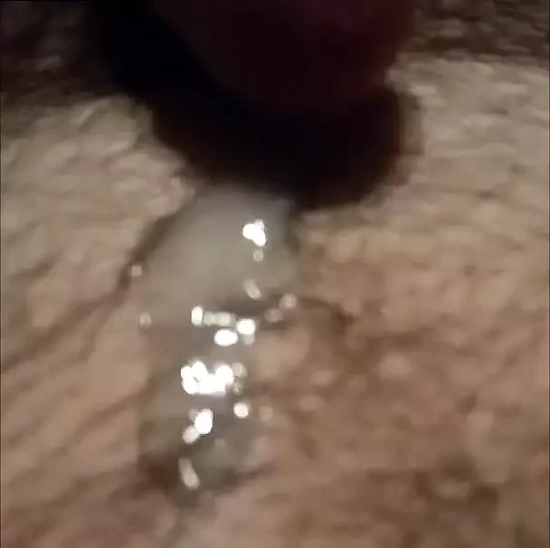 Cum glistening under LED light.