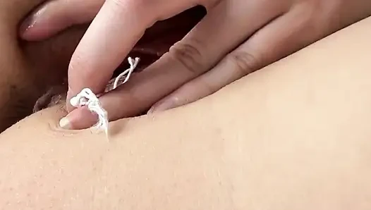 Russian Girl Inserts a Close-up Tampon Deep Into Her Pussy