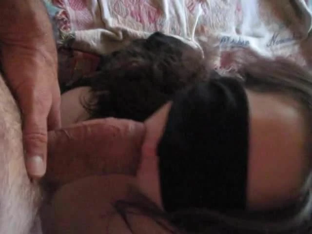 Slutty milf tied up and sucking cock