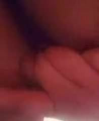 Sexy black girl plays with her pussy