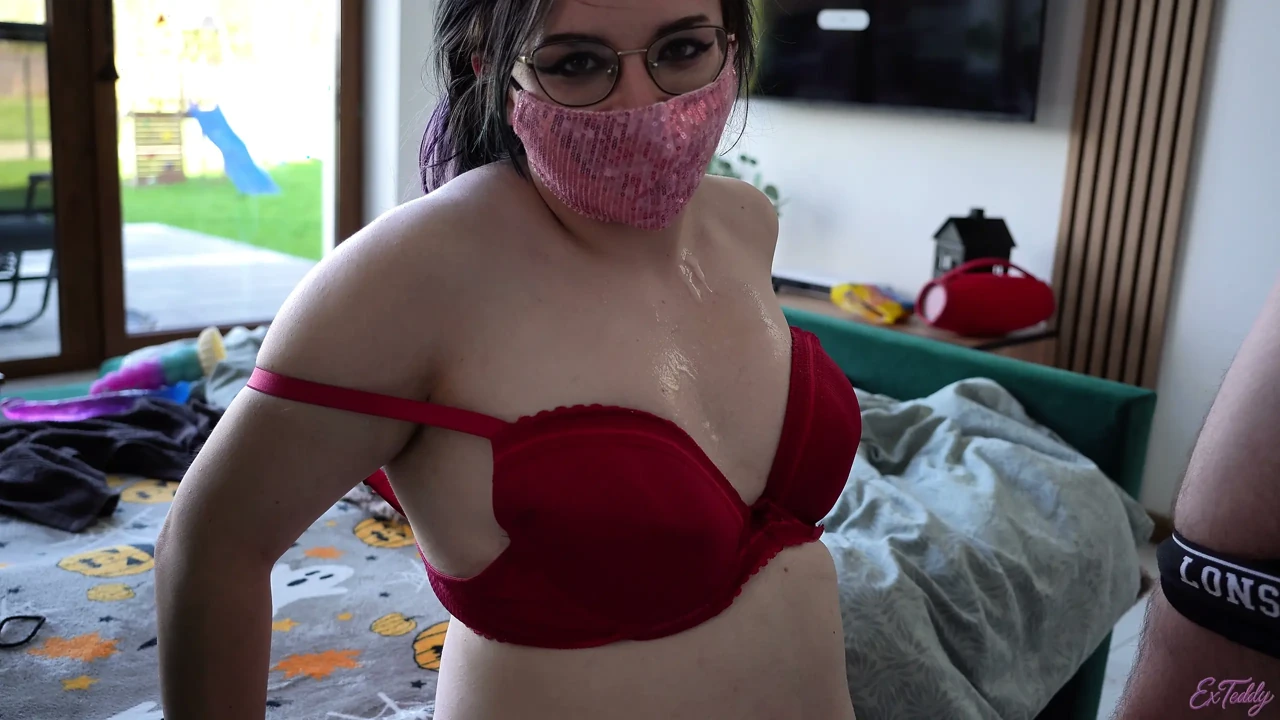 18+ girl in red bra & pink mask giving a slow handjob