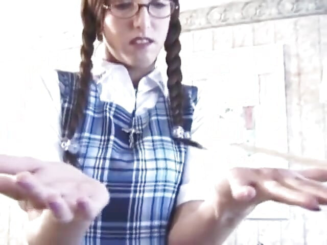 Skinny slut pees on a cup after fucking her cunt