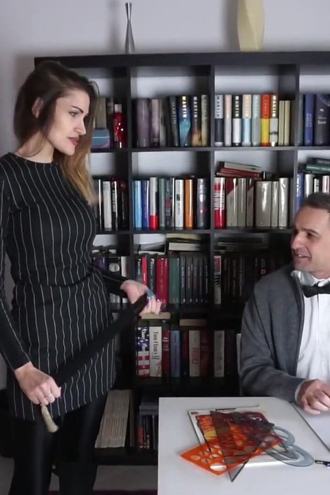 Femdom chick punishes her male slave in the office