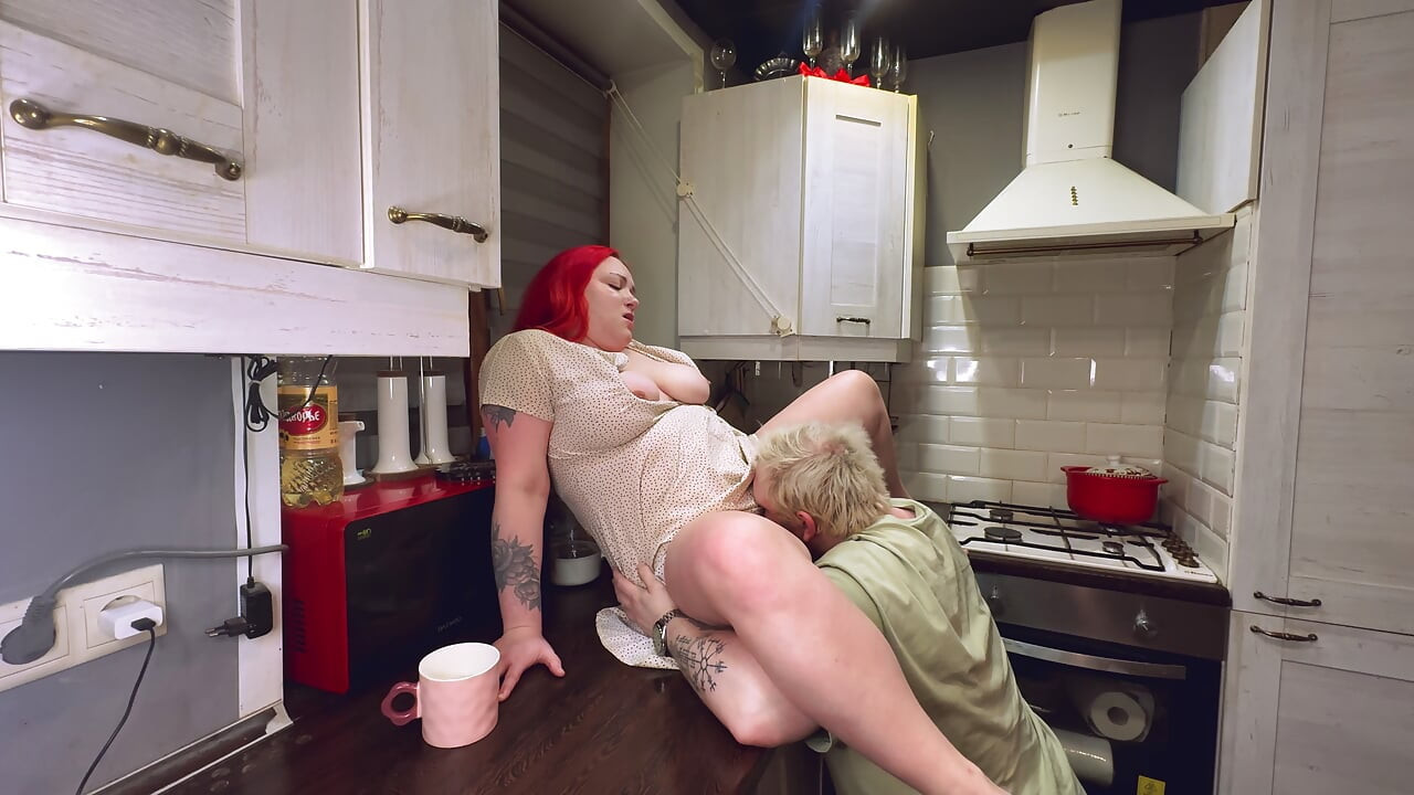 Sex in the kitchen with a red-haired wife. .