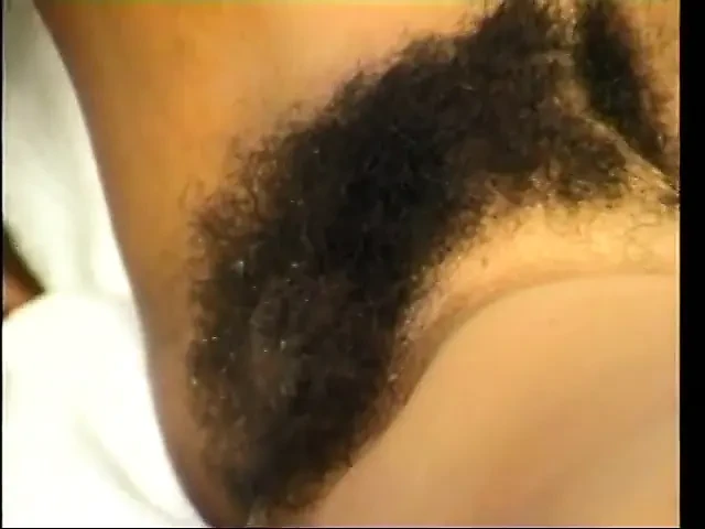 Nice cute curly haured black woman takes big black dick in doggy style