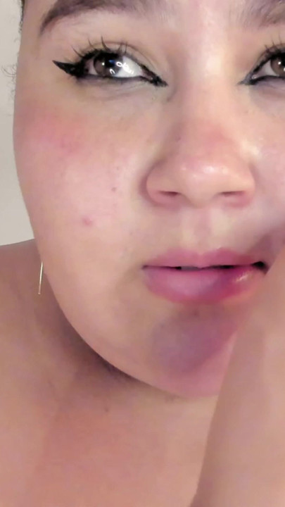 Chubby fills her mouth and throat with an XL dildo