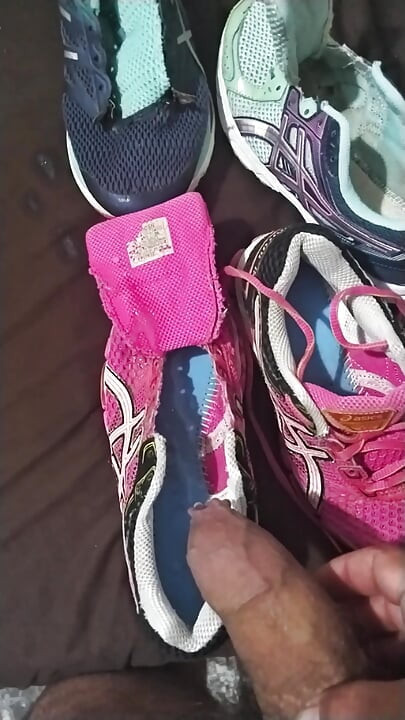 There are so many sneakers on the bed for me to have fun with. I don't have a dildo, so I used a hairbrush