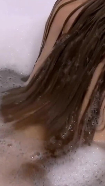Key moment from "Soft Bubbles, Softer Skin. Naked Under the Bubbles"