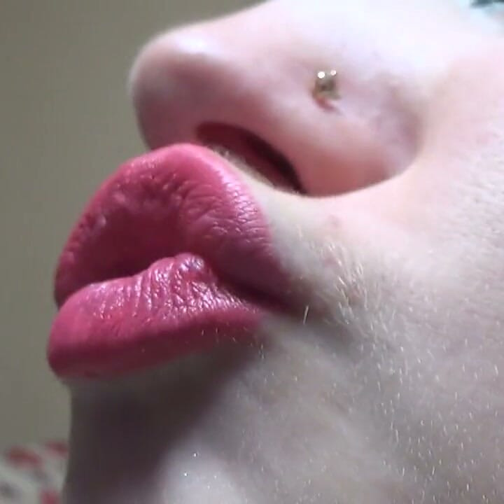Kissing and duck face with big pink lips