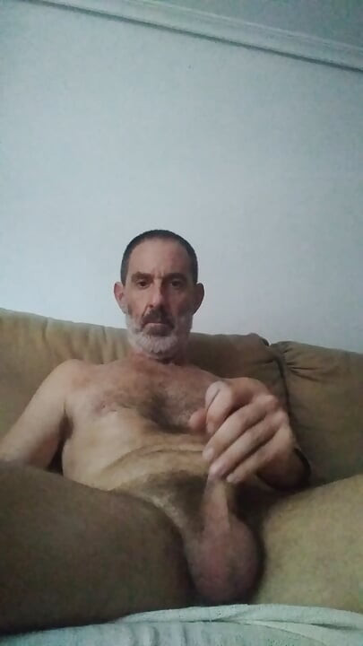 Masturbating