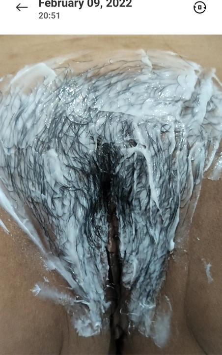 Cindy shaving her hairy pussy.