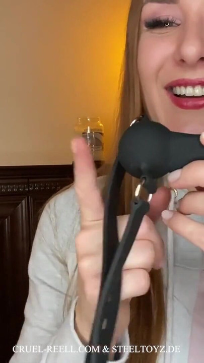 Jaw-dropping moment from "Explore BDSM with Cruel Reell and Steeltoyz: The Silicone Penis Gag for Intense Play"