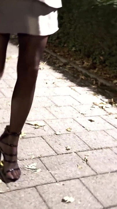 I'm dressed in a sexy business outfit, shiny pantyhose, and black stockings. | Clip 2