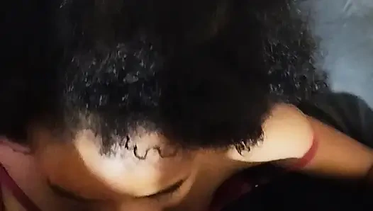 Shy young girl sucking hot